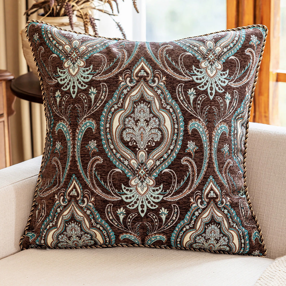 Medallion brown chenille paisley pillow cover on a modern sofa