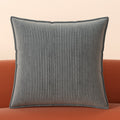 Ridge corduroy pillow cover styled on a sofa in a contemporary living room