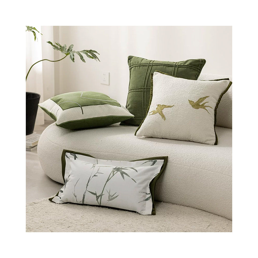 minimalist bird embroidered throw pillow cover on modern sofa