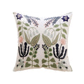 embroidered botanical pillow cover with floral and bird design