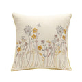 Embroidered floral pillow cover with yellow wildflower botanical design