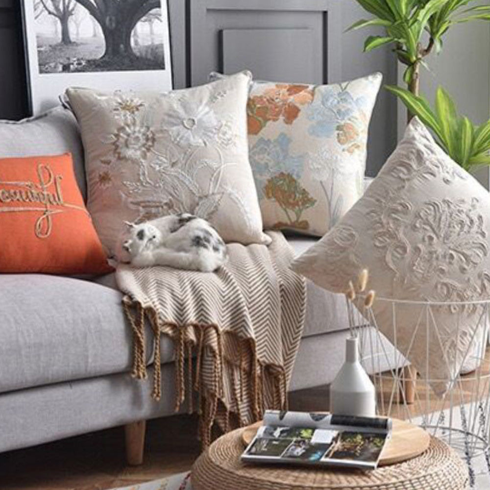Bouquet cotton embroidered pillow cover for a reading chair