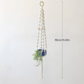 Close-up of natural cotton knots and wooden beads
