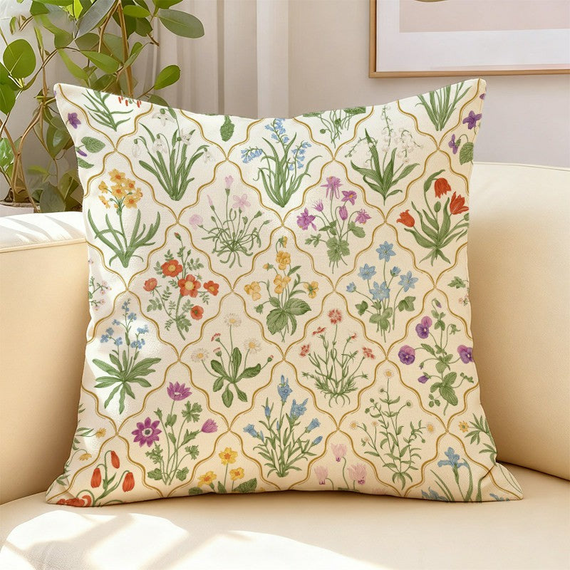 Herbarium botanical floral pillow cover styled on a cream sofa in a bright living room