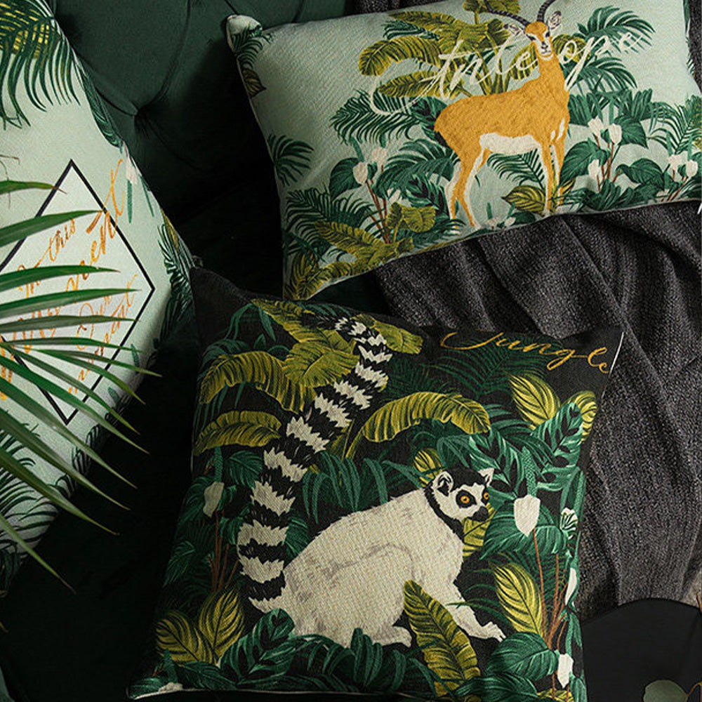 Close-up of multiple jungle pillow covers showcasing durable woven cotton-linen texture.