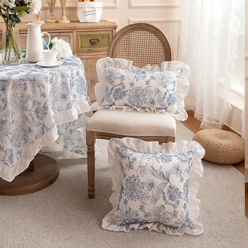 Porcelain blue botanical ruffle pillow covers styled with vintage furniture