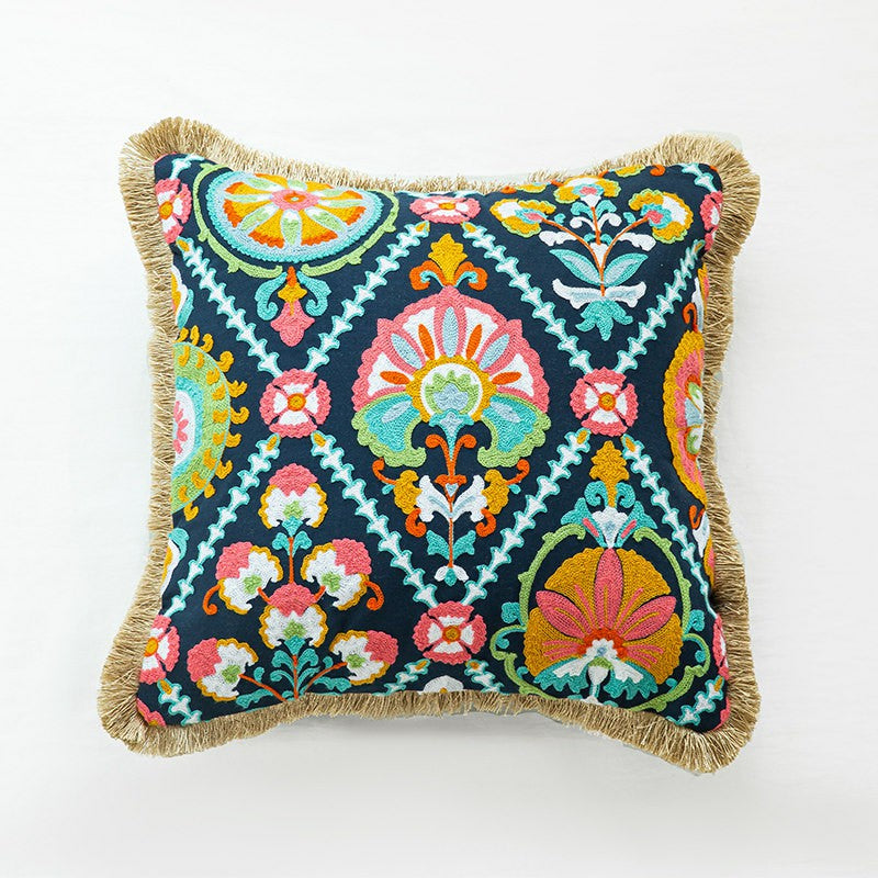 Marbella embroidered boho fringe decorative pillow cover with colorful folk art floral pattern. 