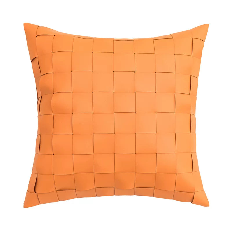 close up basket weave woven fabric pillow cover in orange