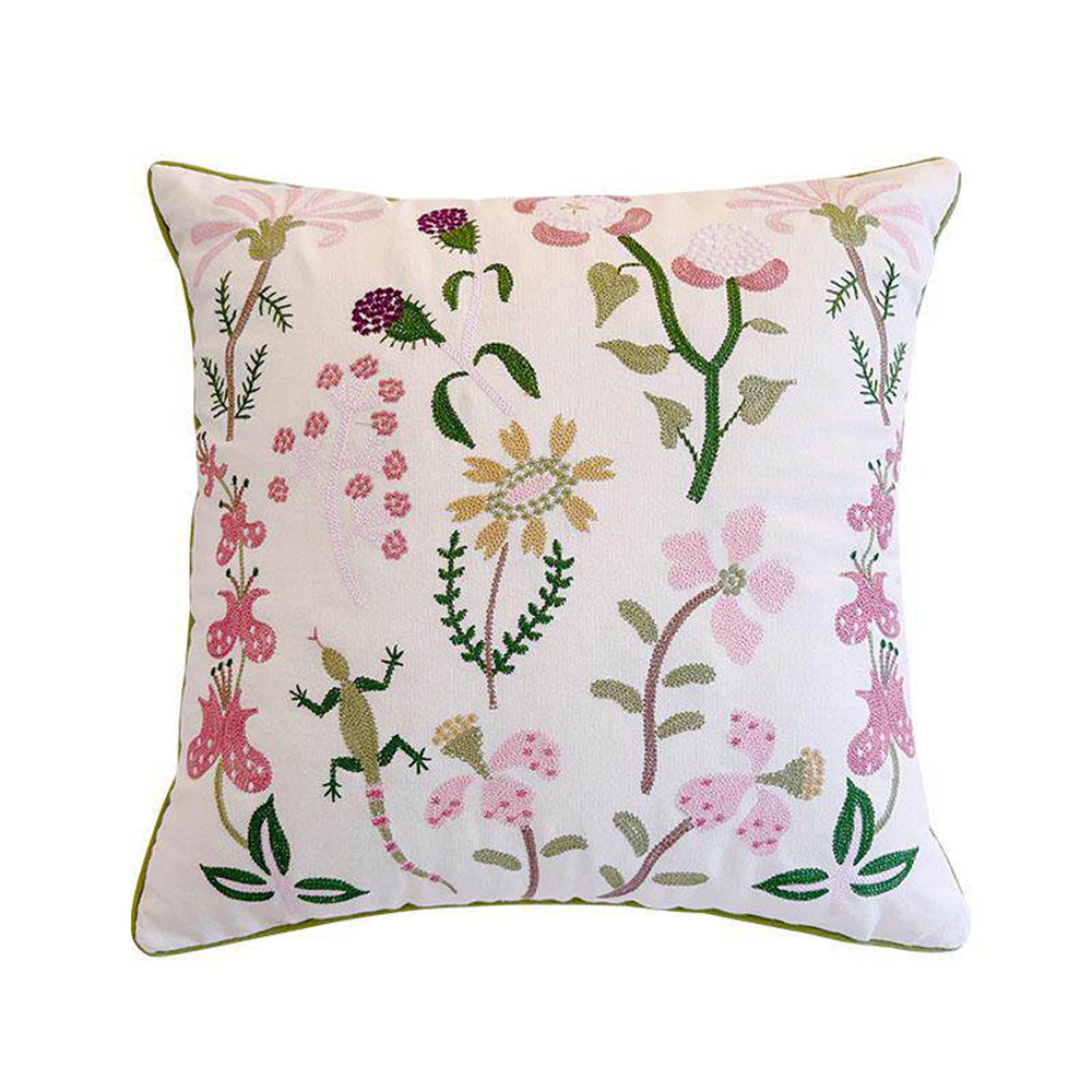 Pink embroidered floral pillow cover with botanical flower design