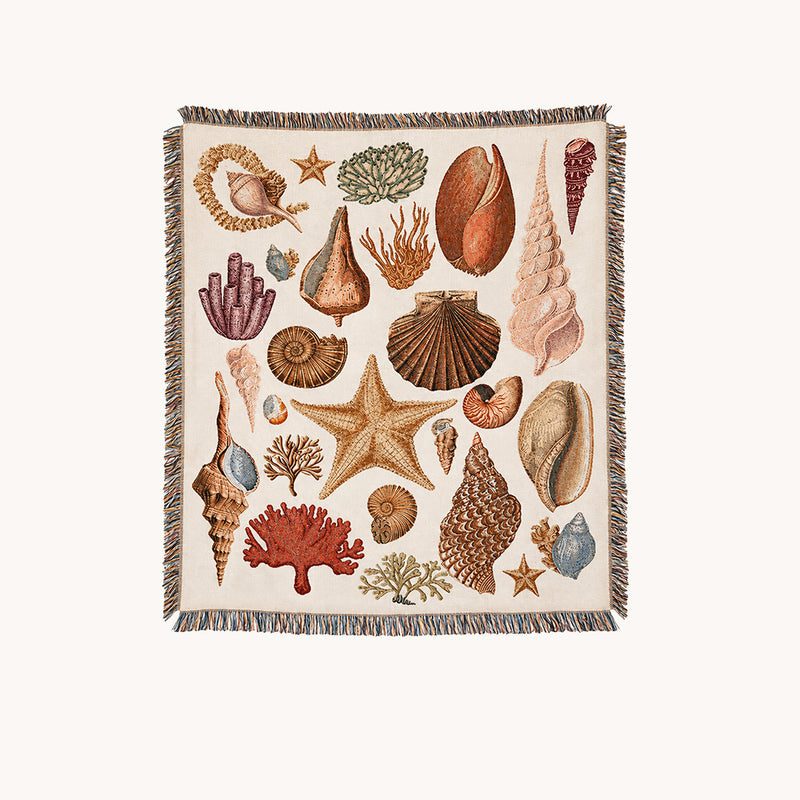 Full Tidepool coastal woven throw blanket with seashell, starfish, coral, and fringed border.