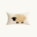 Pasture cream 12x20 lumbar pillow cover with three beige and black tufted sheep