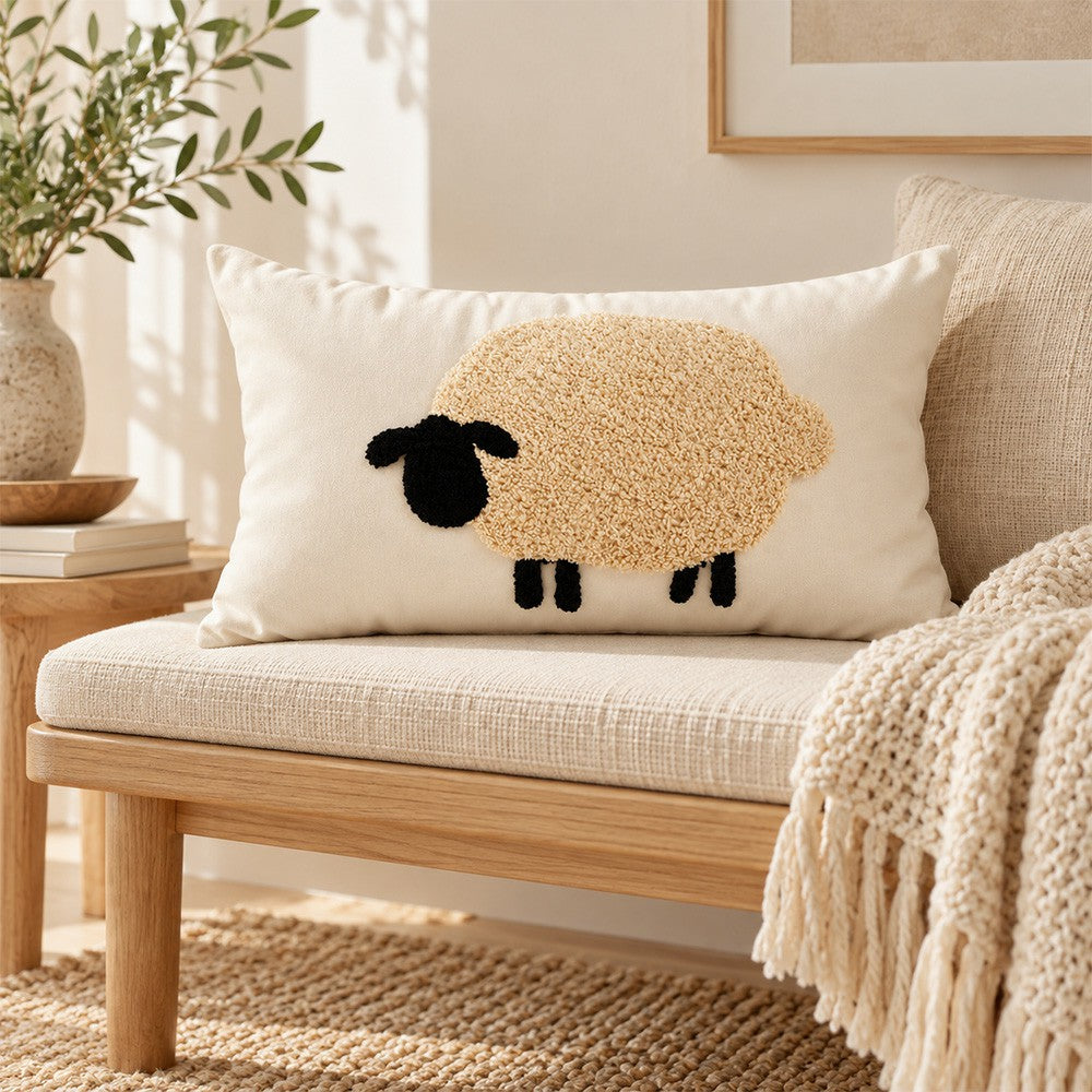 Sheep pillow styled on a wooden bench in a soft neutral corner.