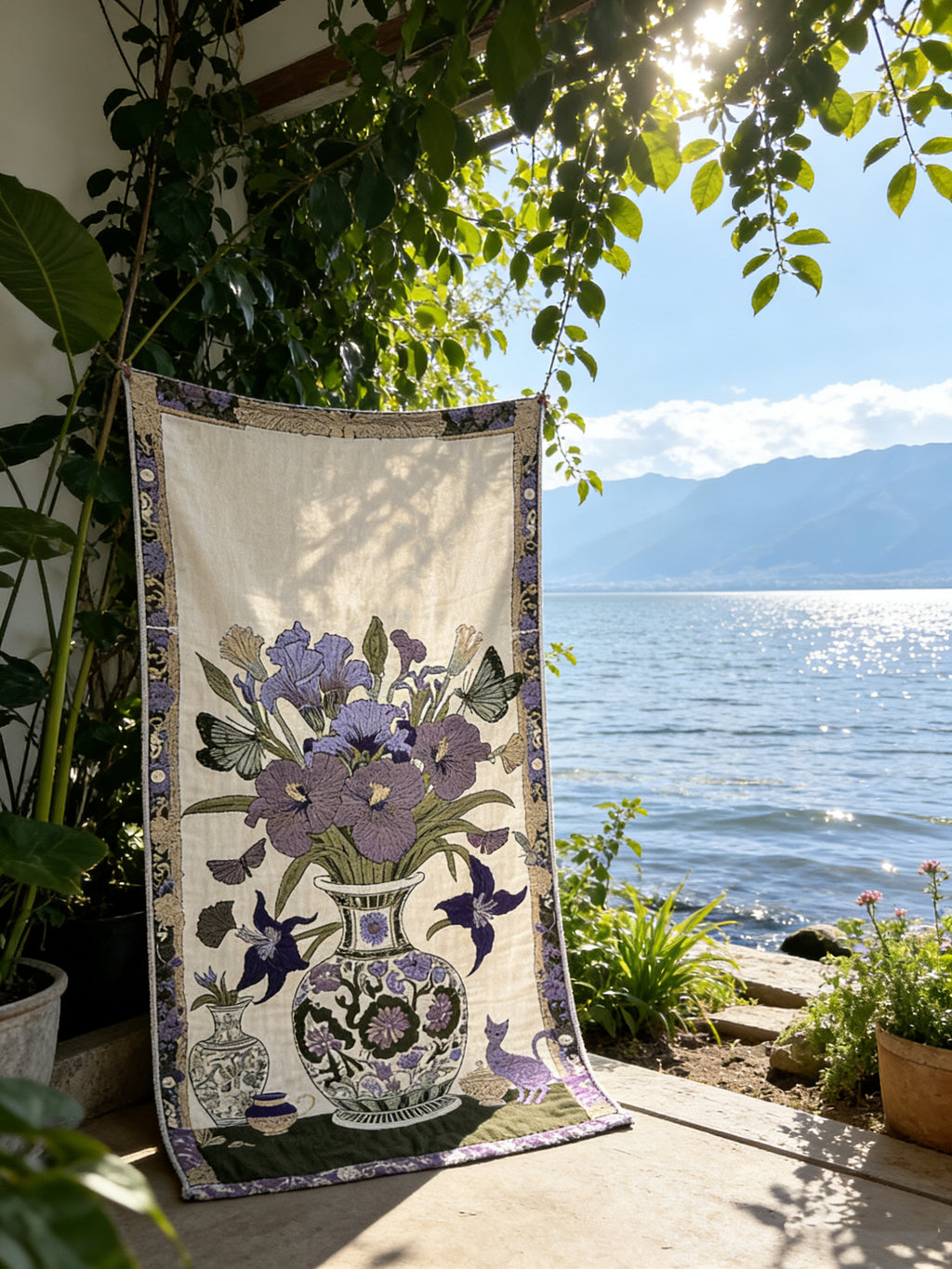 Floribunda iris and butterfly throw blanket displayed vertically beside a lake window