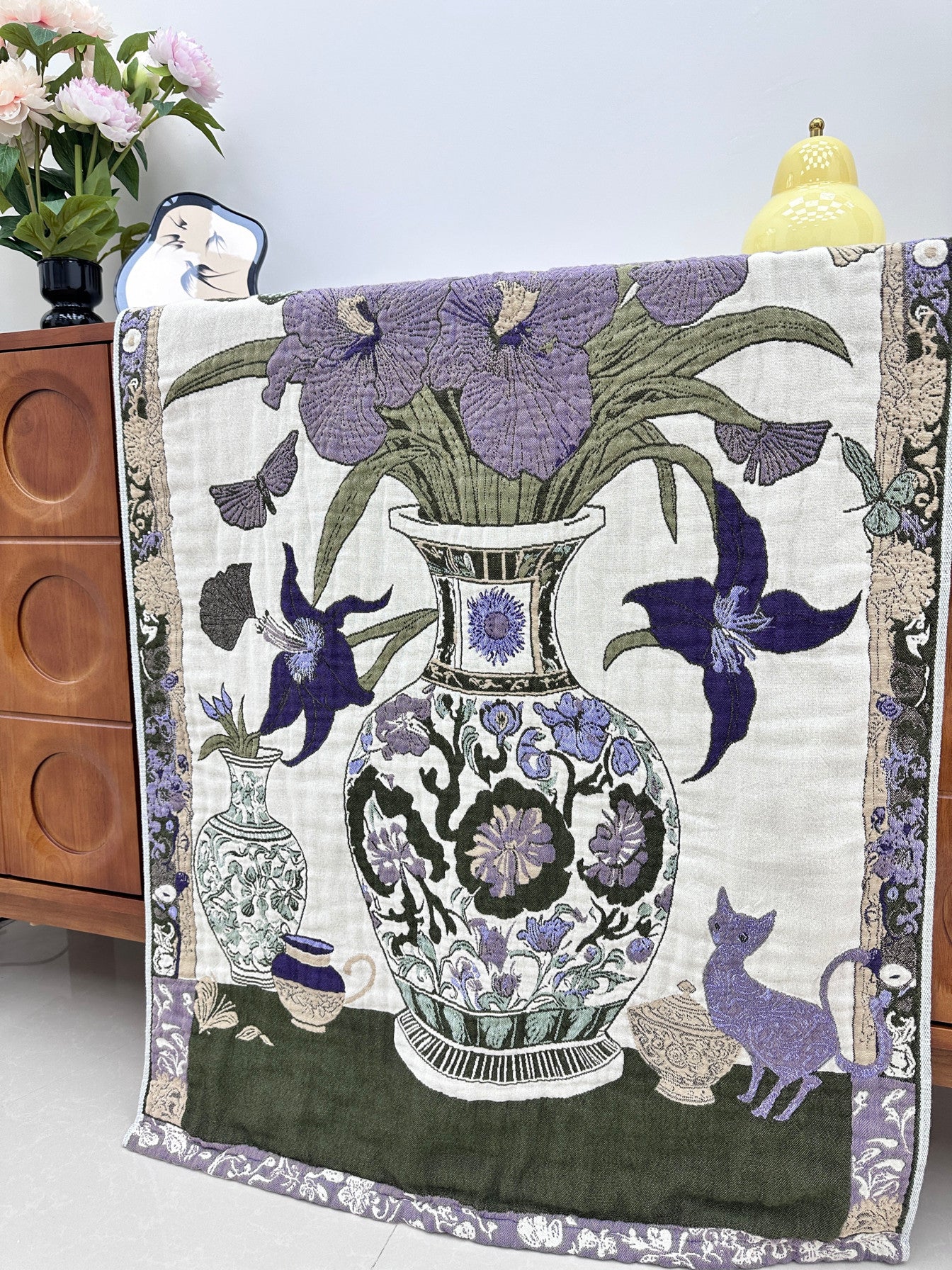 Close-up of the Floribunda woven vase iris butterfly and cat design