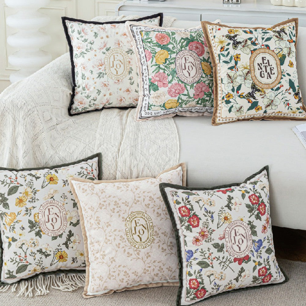 Keepsake ten-design vintage botanical pillow cover collection on a sofa