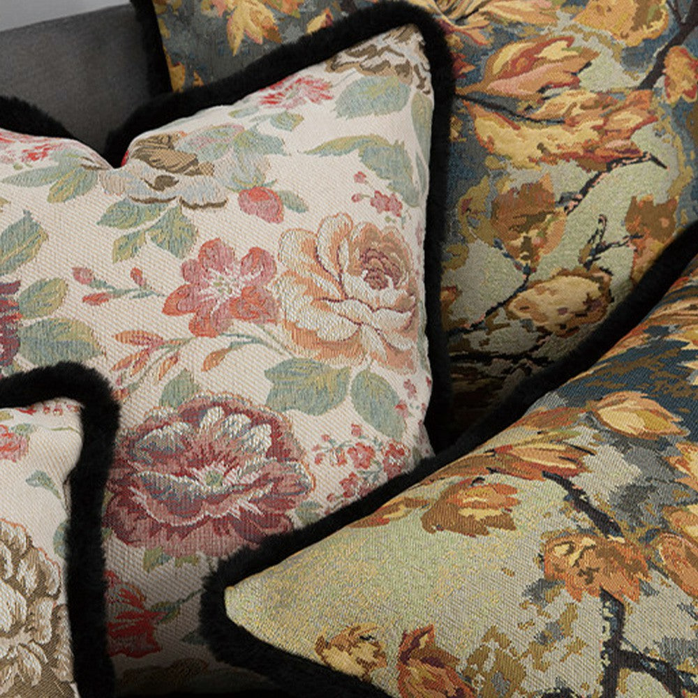 Close-up of black plush trim on a Chateau floral tapestry pillow cover