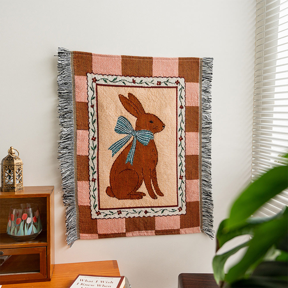 Fablefolk Style E rabbit tapestry with blue bow, pink check border and dark side fringe