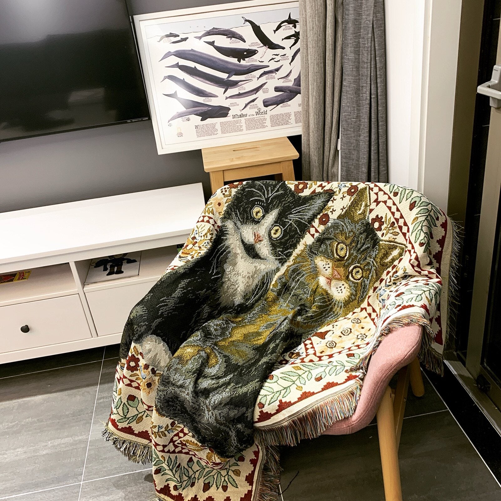 Whisker cat throw blanket styled over a cottagecore accent chair