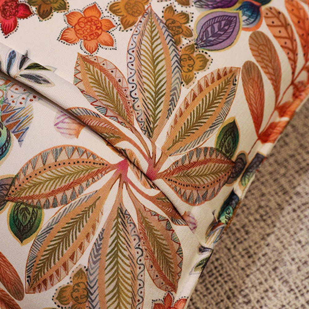 Close-up of colorful botanical leaf print on textured chenille fabric